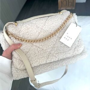 ‘A New Day’ White Sherpa Crossbody Bag w/ Gold Chain